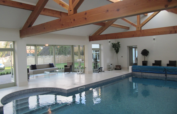 detached-house-harrogate-gallery-6 internal-swimming-pool-and lounging-area-with-timber-beams