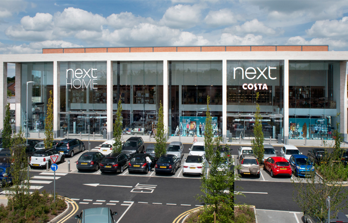 cars-parked-in-front-of-next-home-and-garden-centre